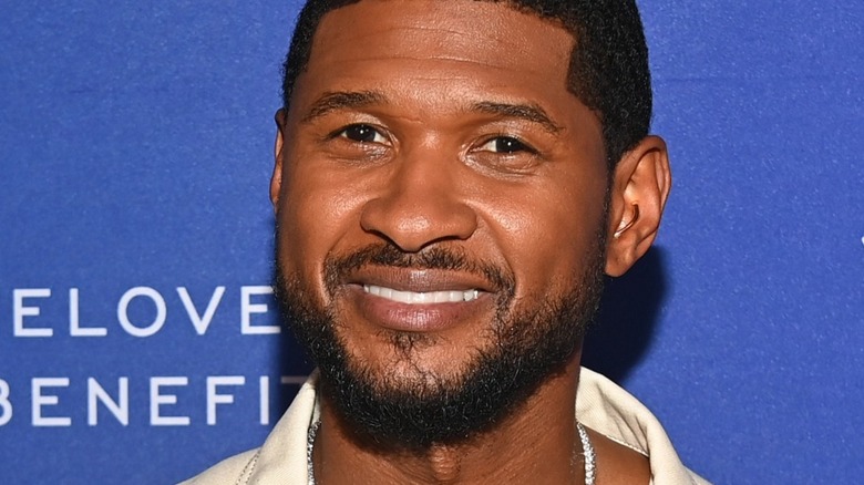 Usher smiling