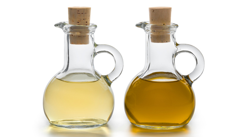 Two bottles of vinegar and oil