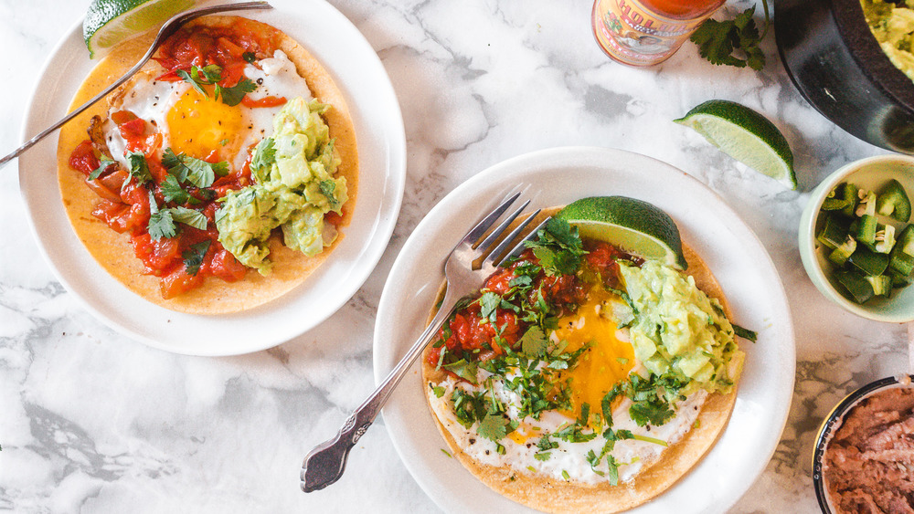 two plates of huevos rancheros