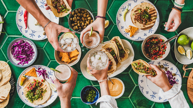 people eating tacos  from above