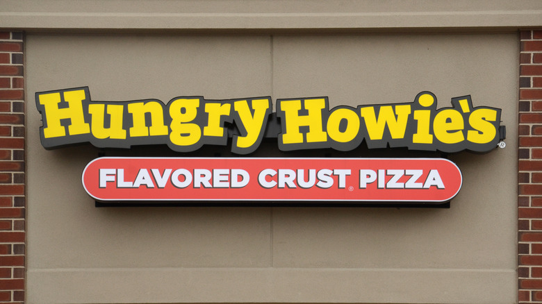 Hungry Howie's sign and brickwall