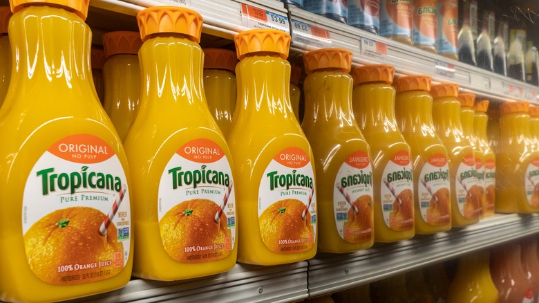 florida orange juice bottles on store shelf