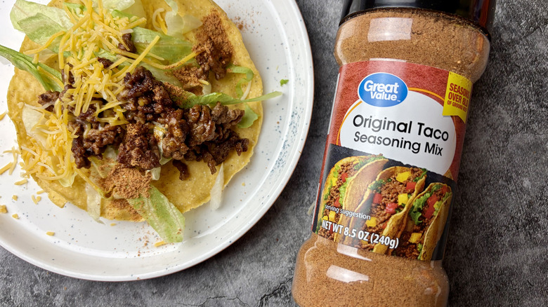 Walmart Great Value Original Taco Seasoning Mix bottle and a taco on a plate