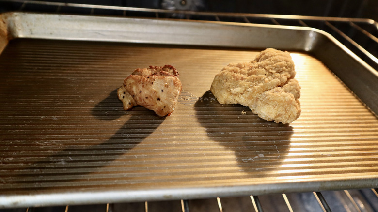 two chicken tenders in red hot oven