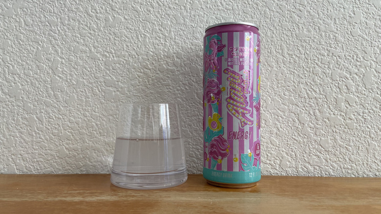 Cotton Candy can beside some poured into a small glass