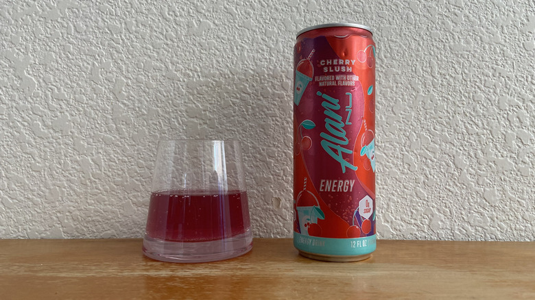 Cherry Slush can beside some poured into a small glass