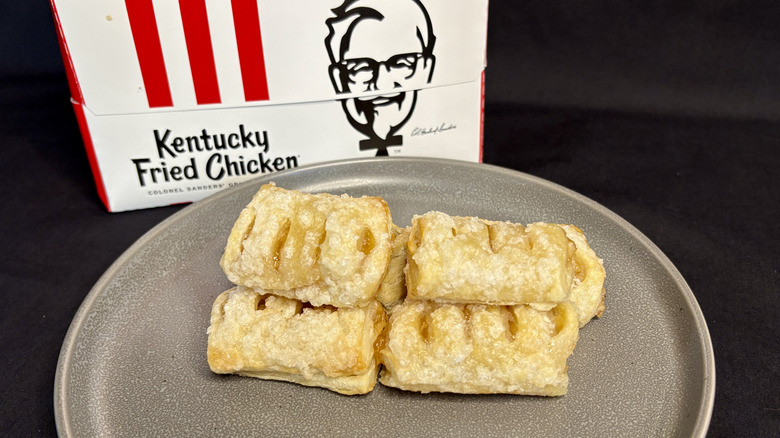 KFC apple pies on plate with box