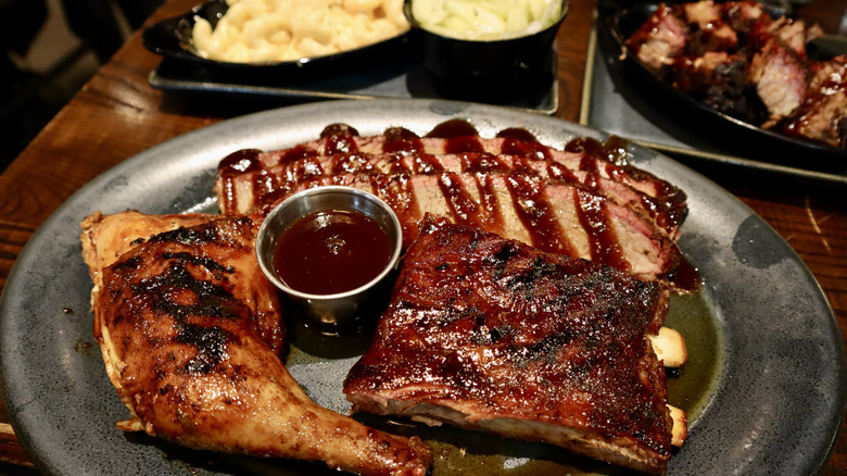 ribs, brisket, chicken barbecue on a plate