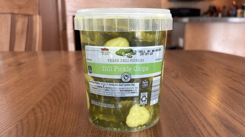 containers of sliced pickles