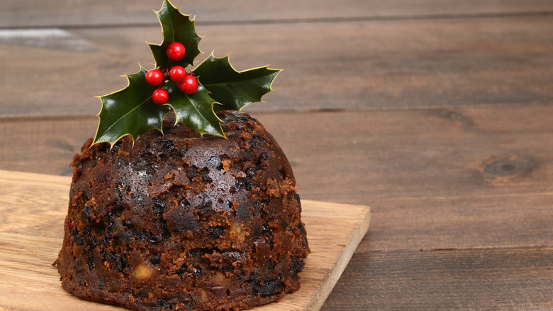 figgy pudding decorated with holly
