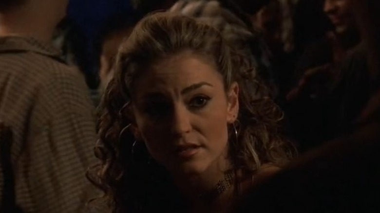 Adriana listening at club