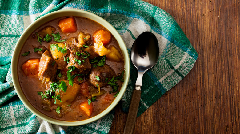 Irish stew with beef, potatoes and carrots in bowl