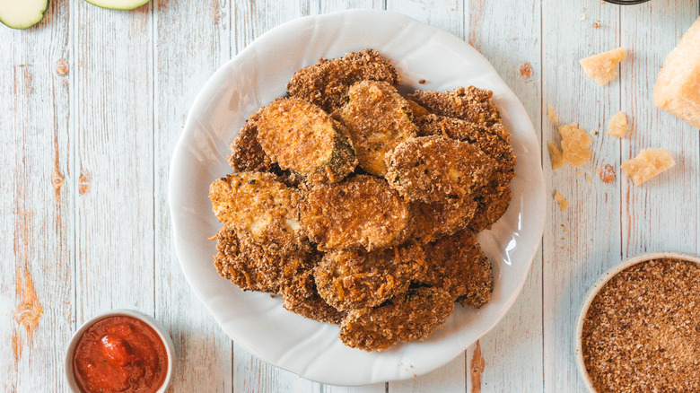 fried zucchini in white bowl