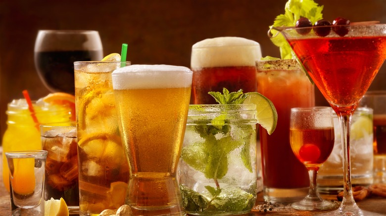 Multiple types of alcoholic beverages on a table.