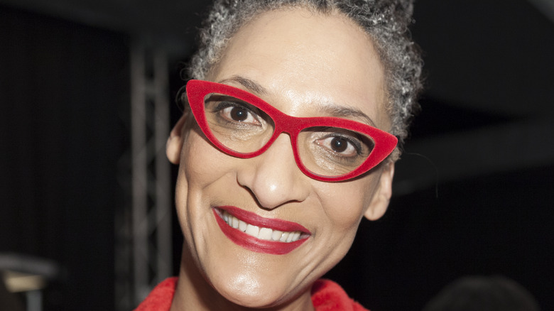 Carla Hall smiling in close-up