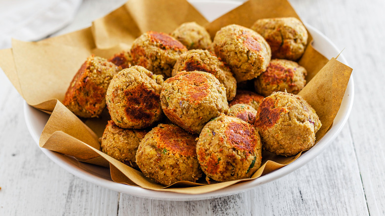 Vegan meatballs in white bowl