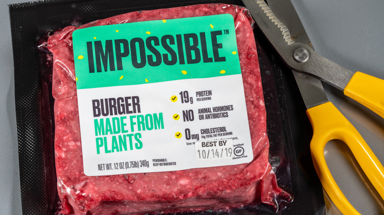 Impossible burger meat and scissors
