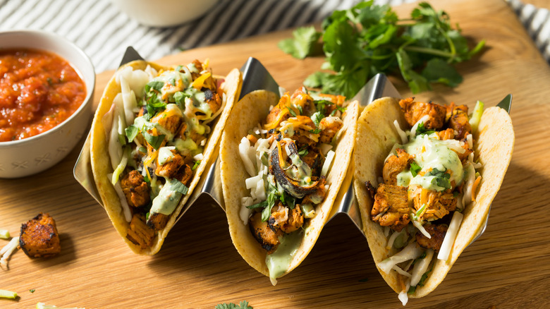 A tray of three chicken street tacos