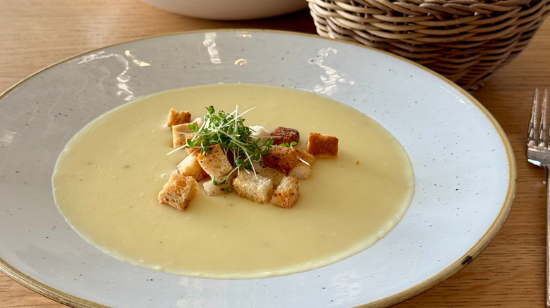Potato soup in a bowl with croutons