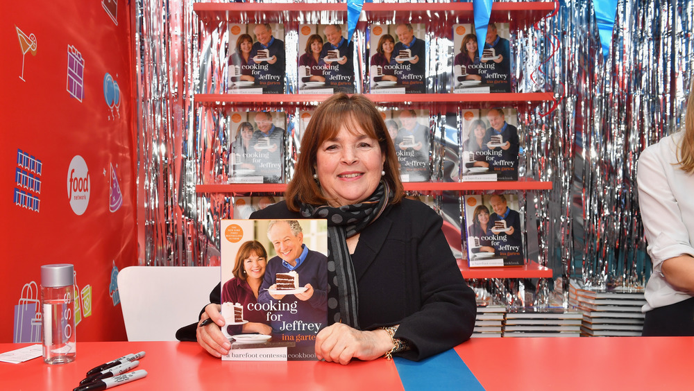 Ina Garten with cookbook