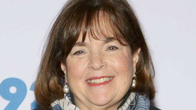 Ina Garten wearing a blue scarf and smiling