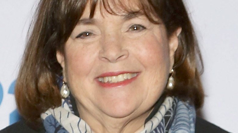 Ina Garten smiling on step and repeat