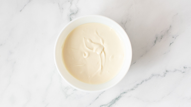 melted white chocolate in a white bowl