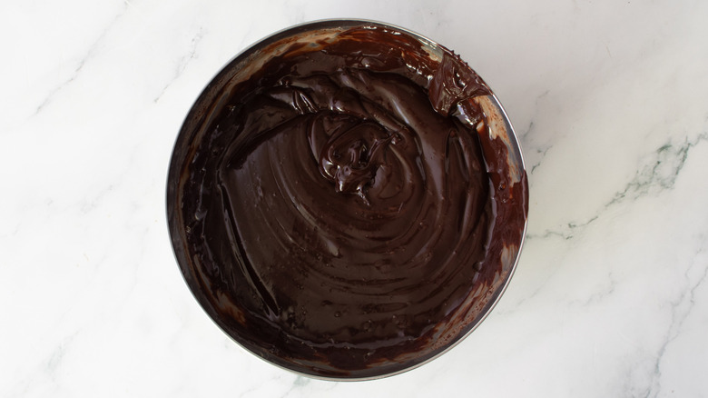 chocolate ganache in a metal bowl