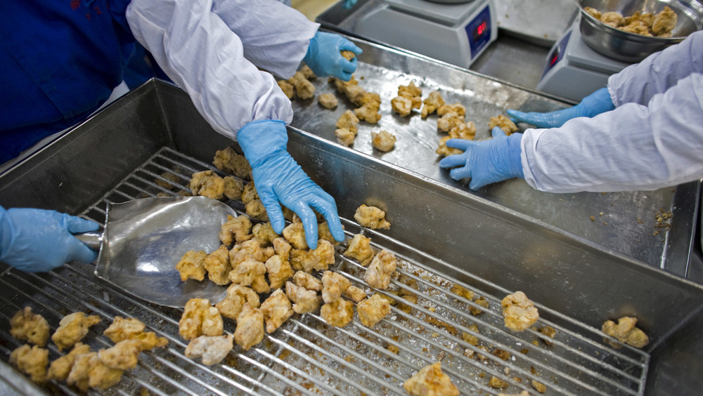 Workers at a poultry plant