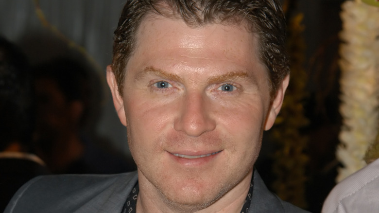 Bobby Flay smiling at event  