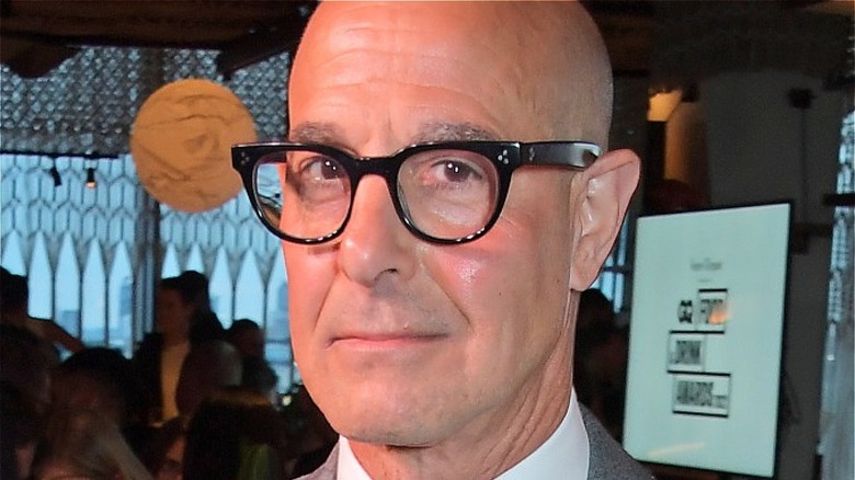 Stanley Tucci in black-rimmed glasses