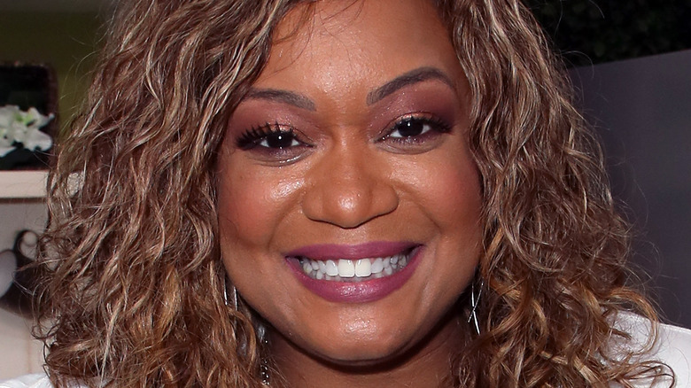 Sunny Anderson smiling