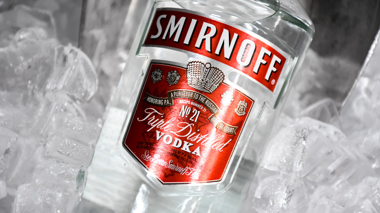 Smirnoff bottle in ice