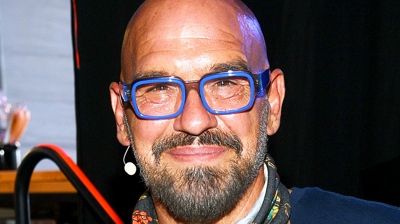 Michael Symon in blue glasses