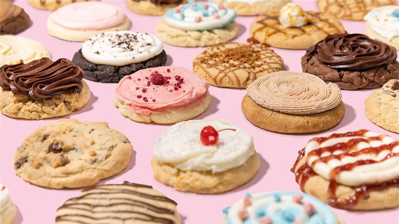 Assortment of frosted Crumbl cookies
