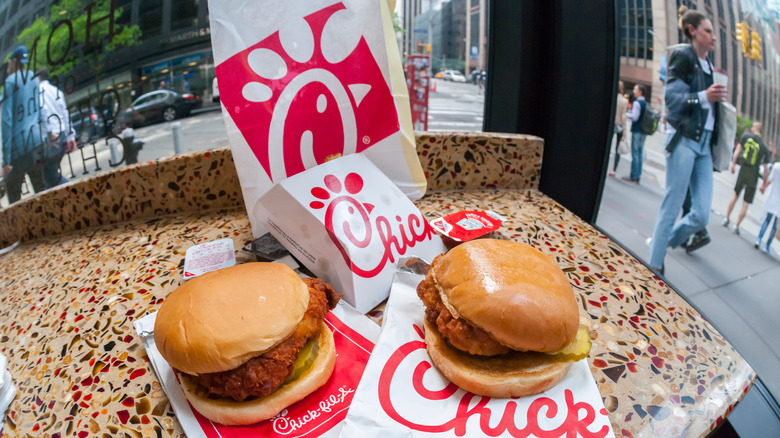 Two Chick-fil-A sandwiches on counter