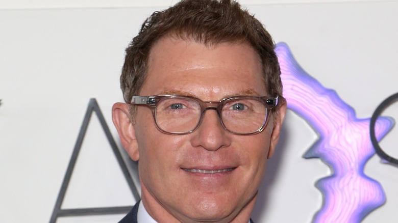 Close up of Bobby Flay wearing glasses