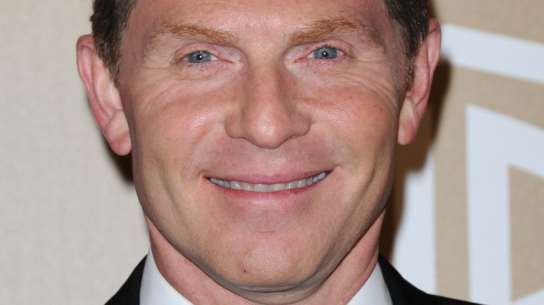 bobby flay smiling in suit