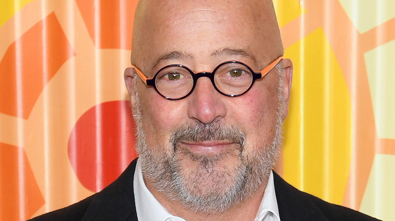 Andrew Zimmern smiling