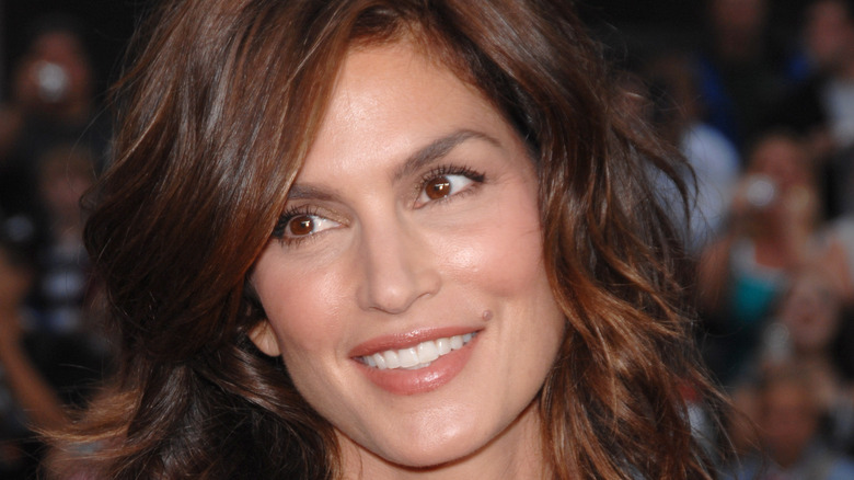 Cindy Crawford smiling at event