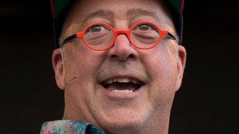 Andrew ZImmern in orange glasses