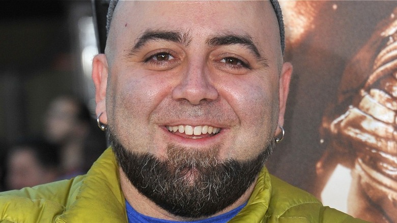 Duff Goldman wearing earrings