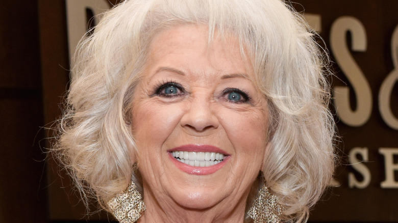 Paula Deen wearing large earrings