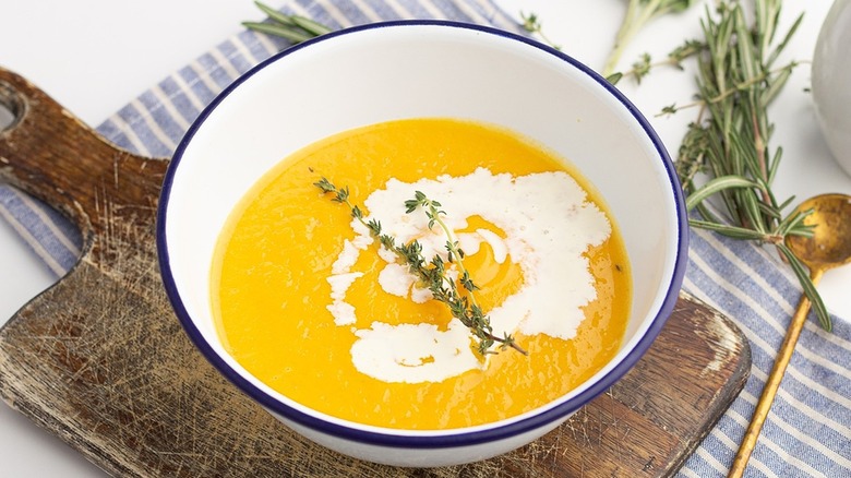 squash soup in white bowl