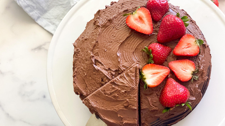 chocolate cake with strawberries and slice from above