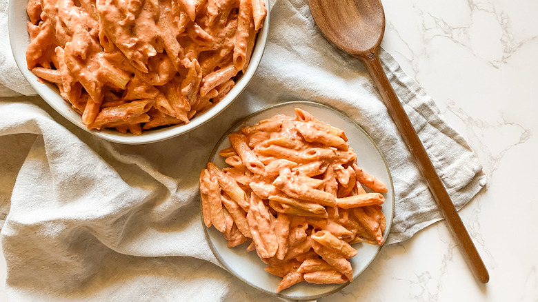 creamy penne on plate