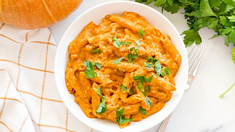 pumpkin pasta in white bowl 