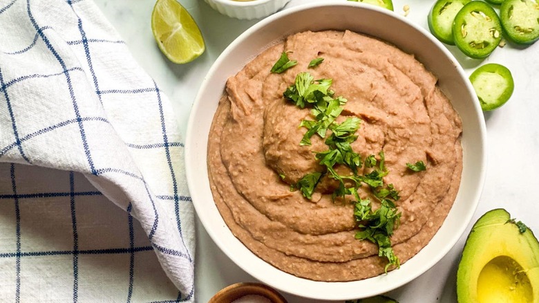 serving dish with refried beans 