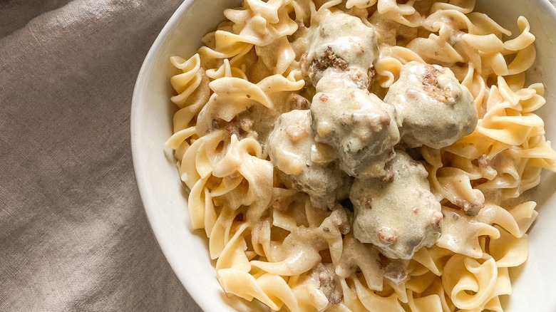 Swedish meatballs over egg noodles