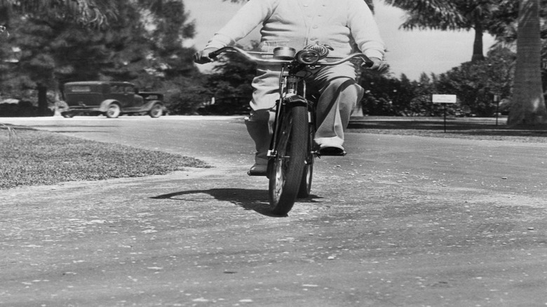 John Kellogg riding a bike